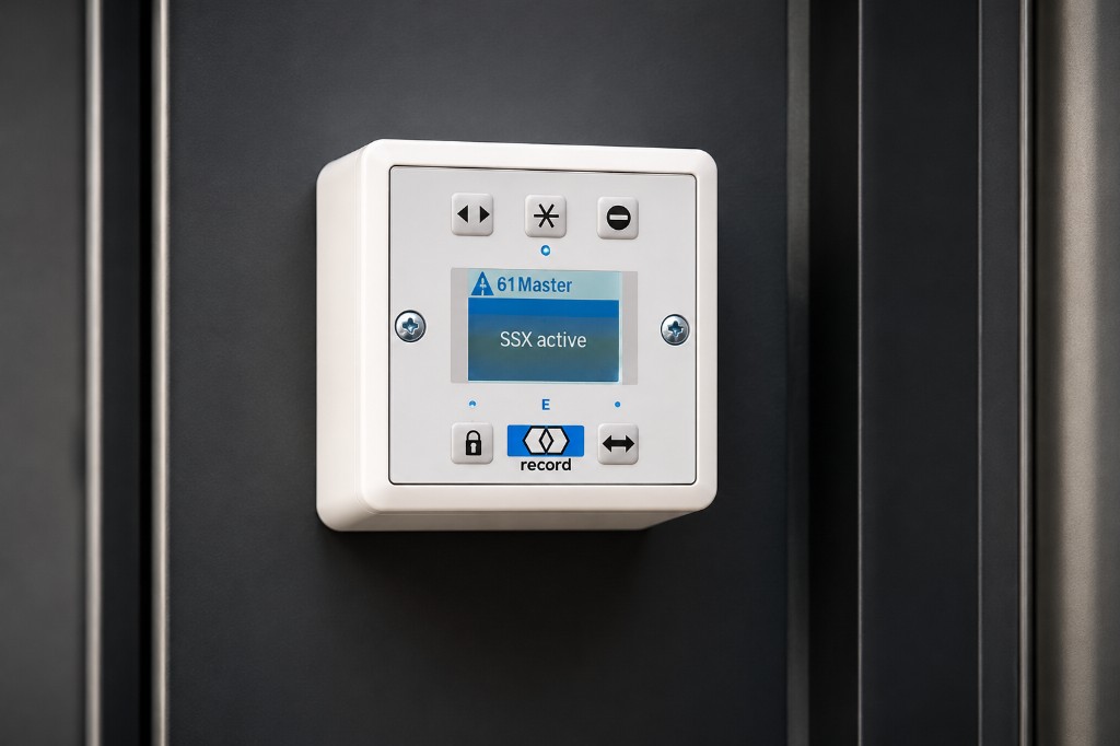 Record automatic door programmer control panel mounted on a commercial door frame