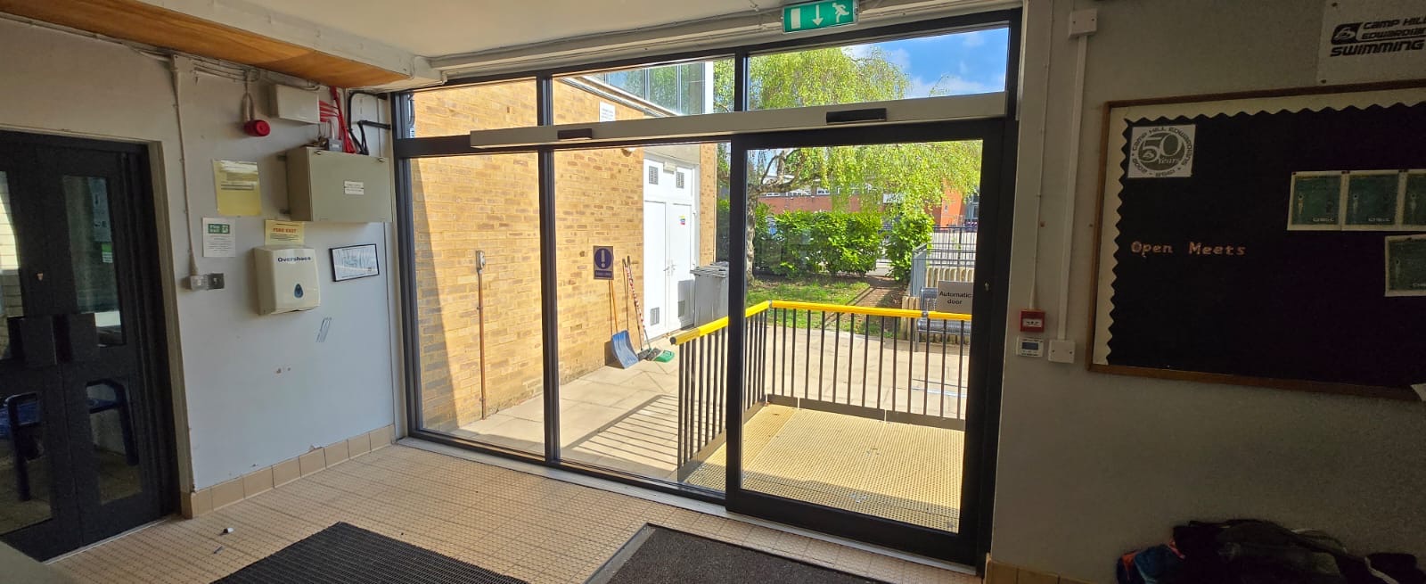 Aluminium commercial door system under planned maintenance