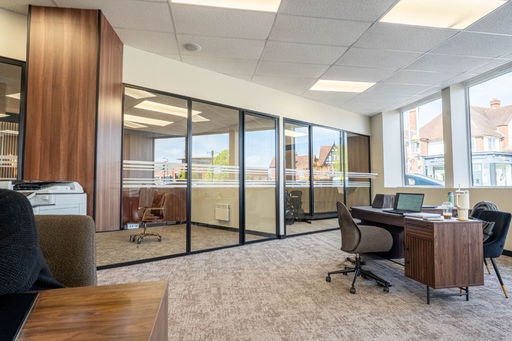 Black-framed ID30 internal glass partitions & hinged doors at an estate agency office in Sutton Coldfield