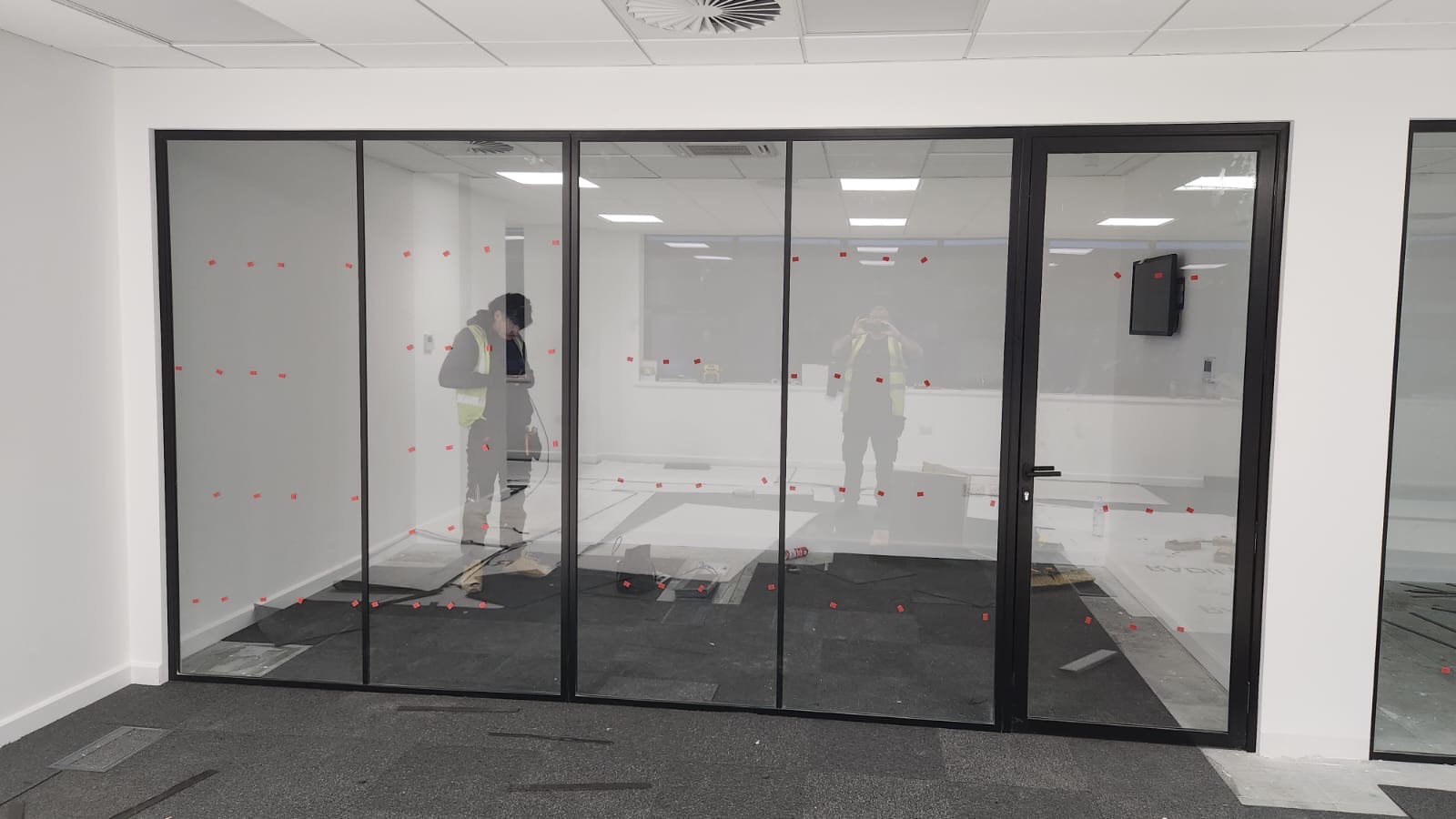 Internal glass partitions installed in a commercial office interior