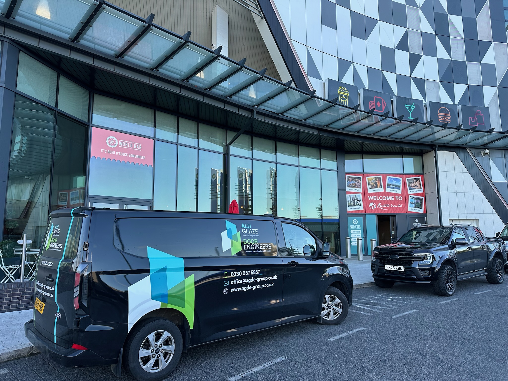 Aluminium fire exit door installation at an education academy in Surrey